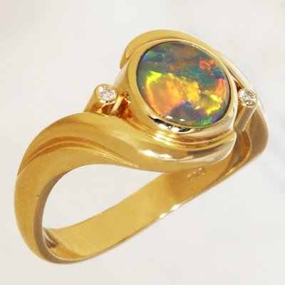 Custom Made 18k Yellow Gold Ring with a SOLID SEMI BLACK OPAL Large rolling flashes of the brightest fire. With VIDEO